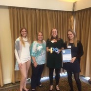 Photo of the Food First team holding their PrescQIPP Award
