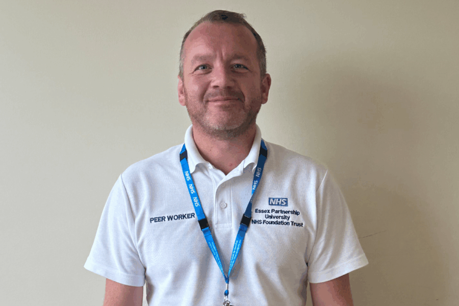 man in peer worker uniform