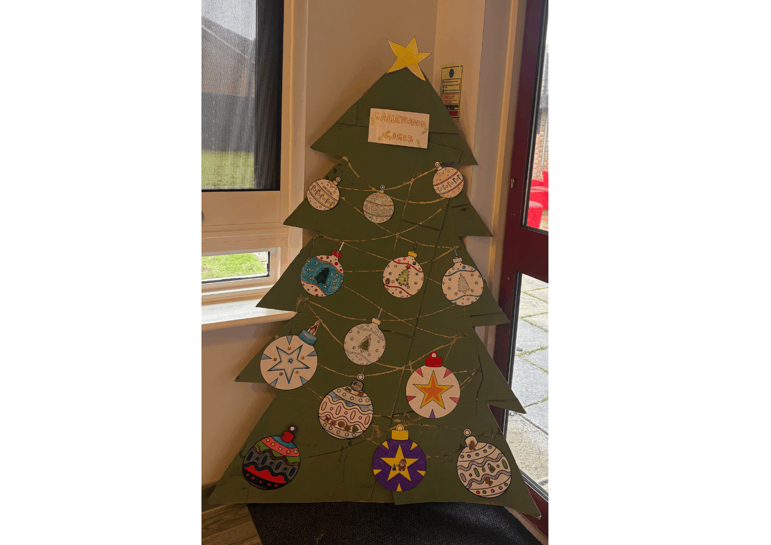 Christmas Tree created by patients on Galleywood, made out of cardboard.