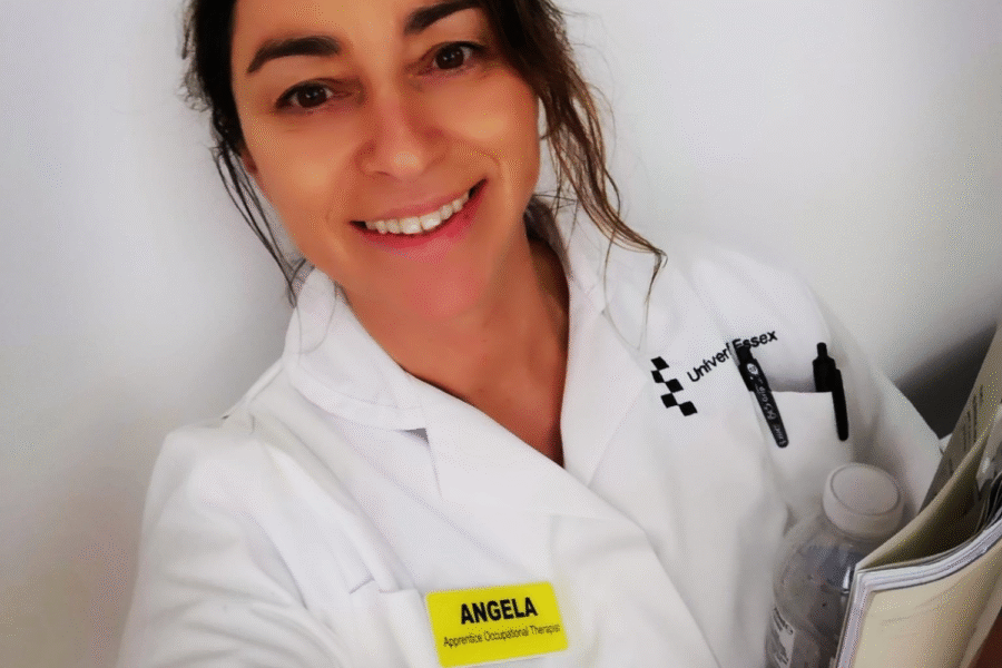 Angela Mole, an apprenticeship Occupational Therapist, smiling in uniform.