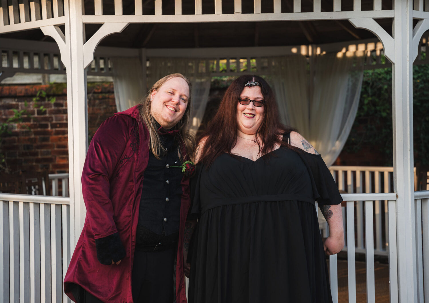 Michael Armstrong-Ingram with wife Kirsty standing under a gazebo