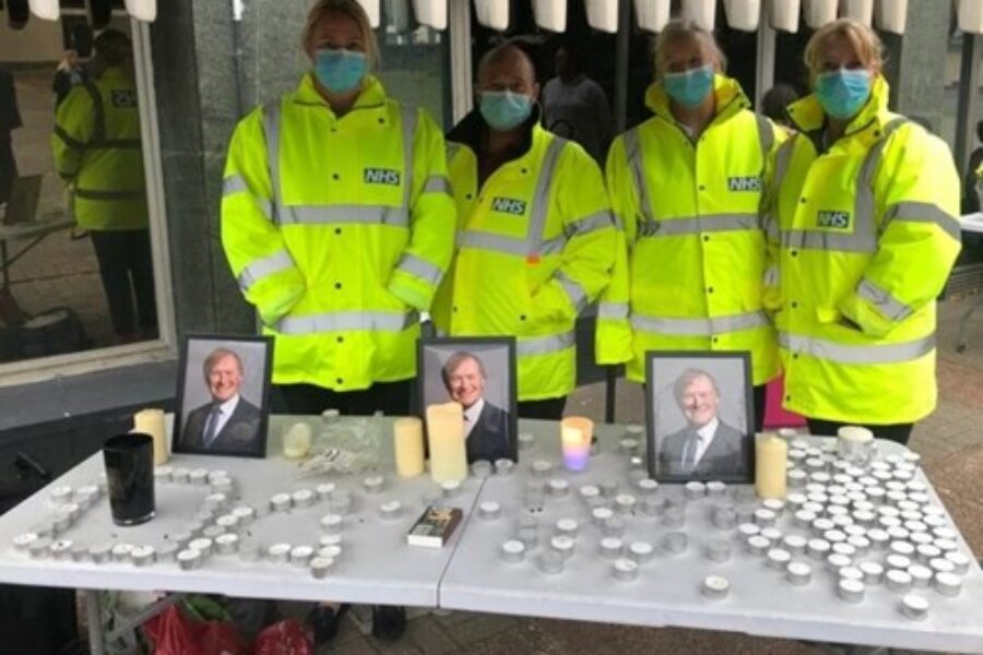 Photo of staff joining a vigil for MP David Amos