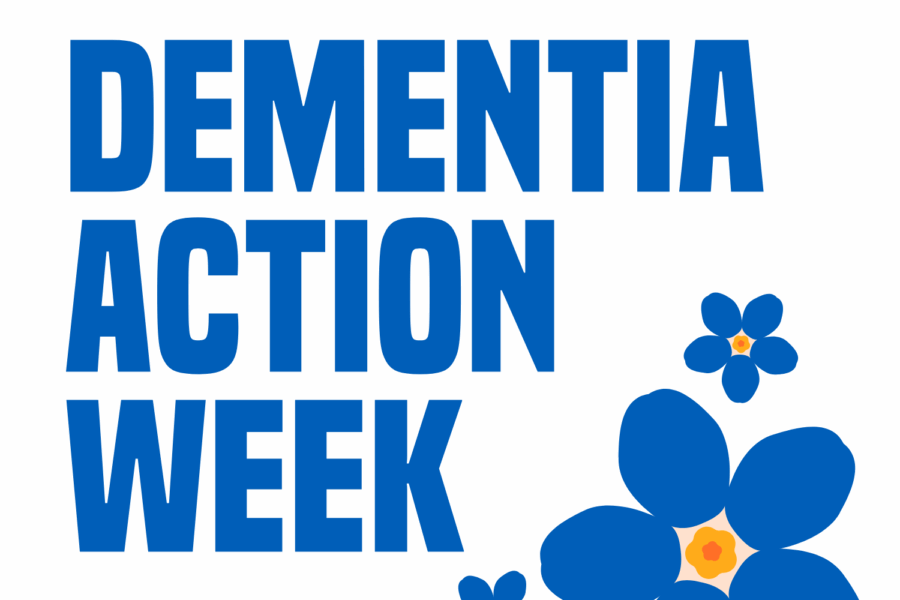 Dementia action week text with blue flowers