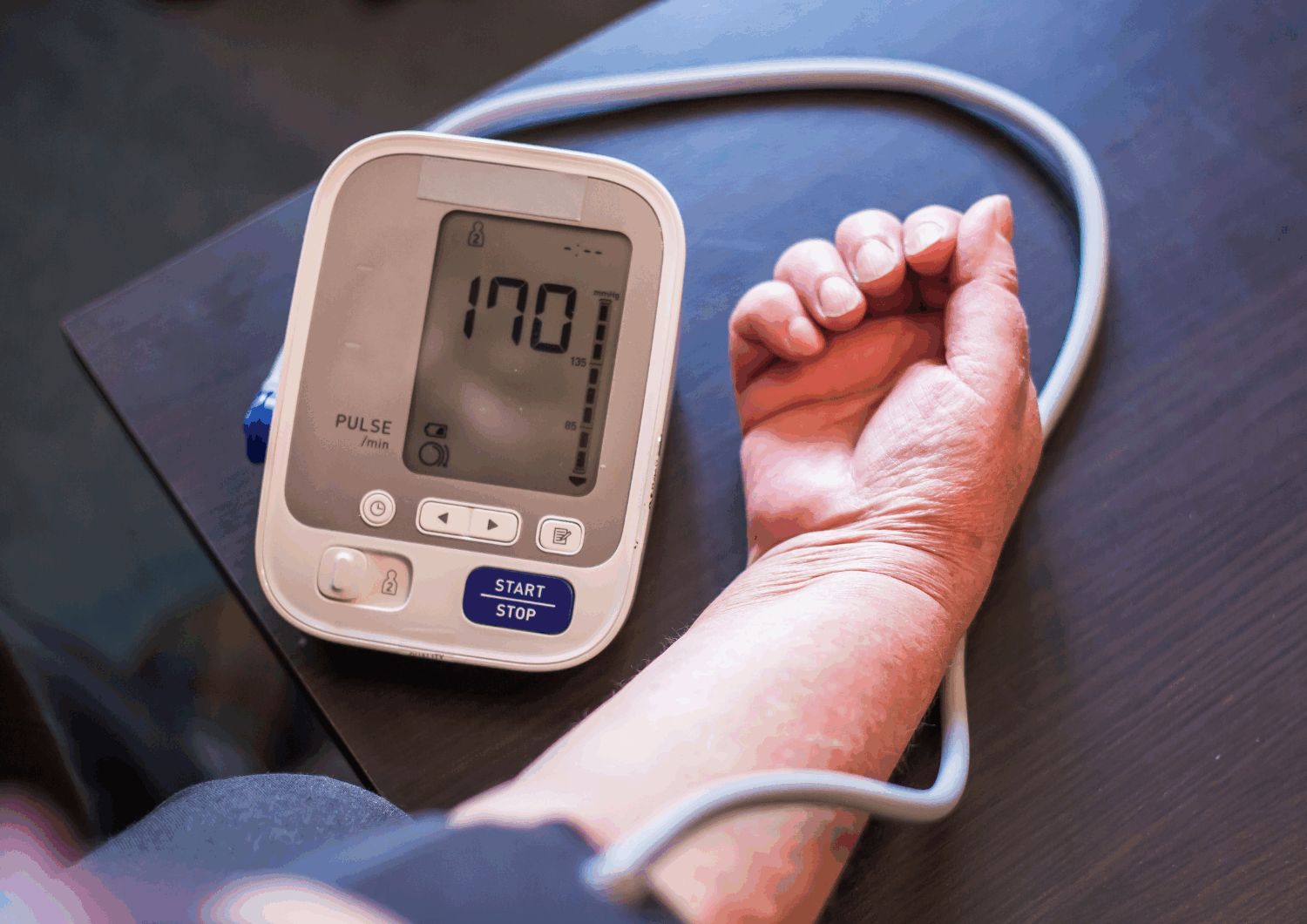Image of a blood pressure machine with a reading