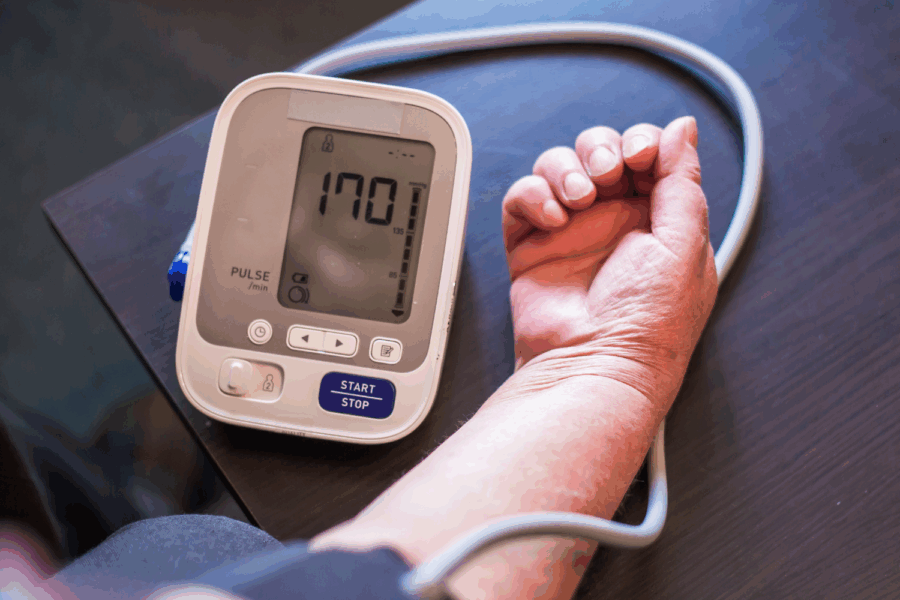 Image of a blood pressure machine with a reading